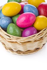 Gordijnen colorful easter eggs in basket © kubais