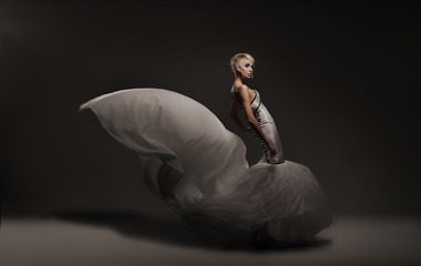 Young beauty woman wearing gorgeous dress