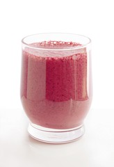 black berries mixed with yoghurt as tasty dairy coctail