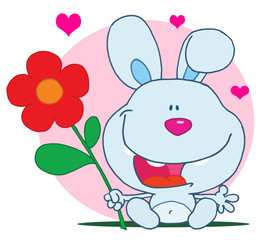 Obraz na płótnie Canvas Happy bunny holds flower
