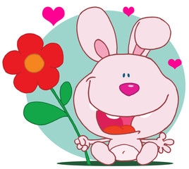 Pink bunny holds flower