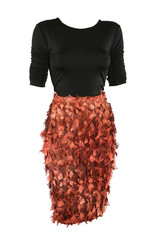 Black shirt and copper color skirt dressed on a mannequin