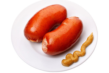 Boiled sausages with mustard