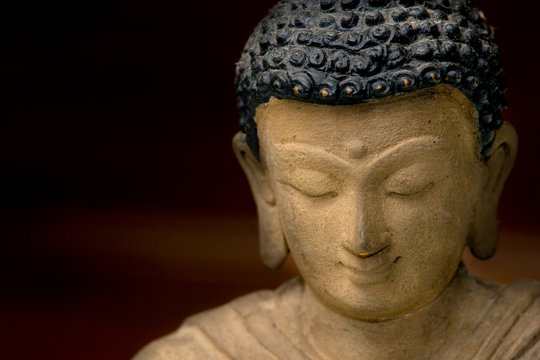 Close-up picture of a Buddha Face in Bronze, from Nepal.