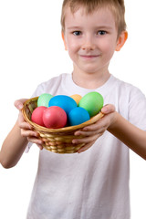 Fototapeta na wymiar Boy with a basket with Easter eggs