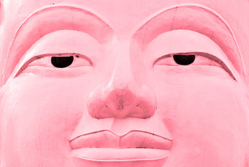 Pink buddha face.