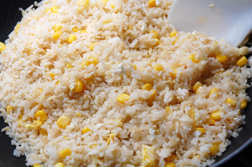close up of fried rice with sweet corn