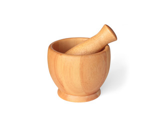 Wooden pestle and mortar on white background