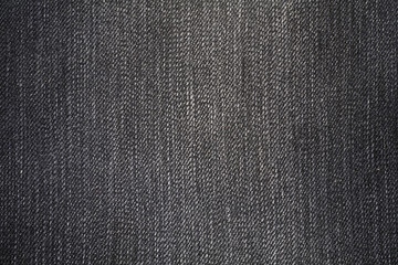 Dark jeans fabric with a visible structure as a background