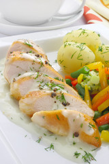 Chicken breast with vegetables and sauce