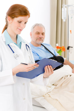 Hospital - doctor examine patient broken arm