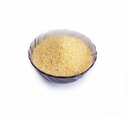 Corn groats on a white background