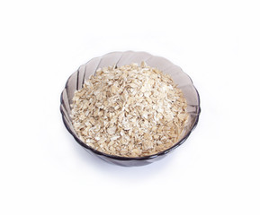 Oat groats on a white background