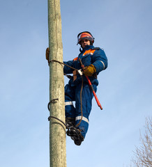 Electrician on a pole