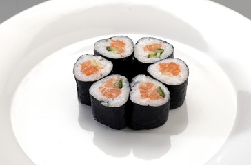 six appetizer sushi with salmon