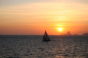 Fototapeta na wymiar Yacht At Sunset