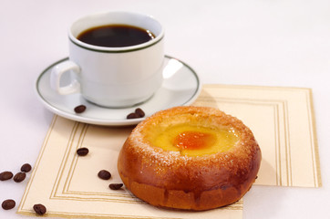black coffee and sweet roll