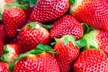 background of red big juicy ripe strawberries