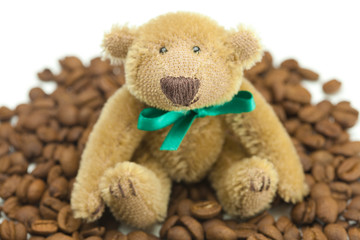 teddy bear with a bow and  coffee beans