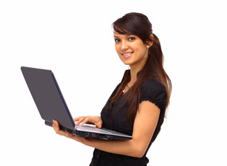 The beautiful business woman with the computer on