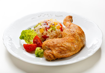 Roasted chicken leg, rice and vegetables