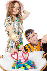 children and Easter eggs isolated on white