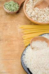 rice, pea, spaghetti and oat in plate on table