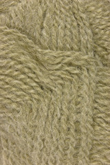 Natural beige fine wool threads texture clew macro closeup backg