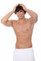 Fototapeta premium Młody człowiek z bólem głowy.