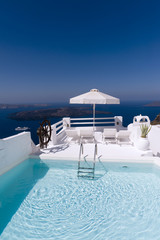 Plakat sea view from the pool of a hotel in santorini