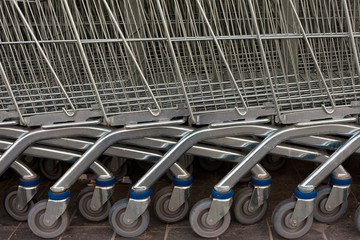 Row of Metal Shopping Carts