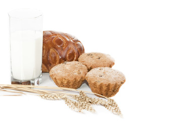 Glass of milk and pastries.