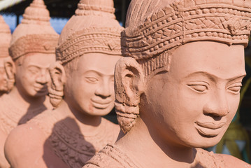 Traditional statues guarding the entrance to a temple