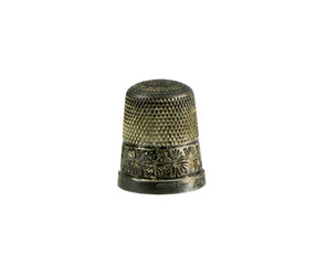 antique sterling silver thimble on a white background