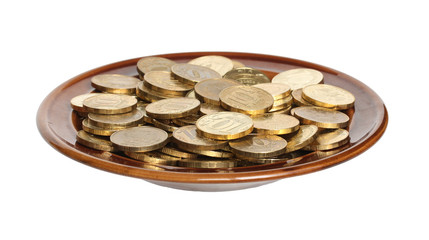 Coins on a plate.