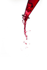 rote Flüssigkeit fließt aus einer Flasche #2