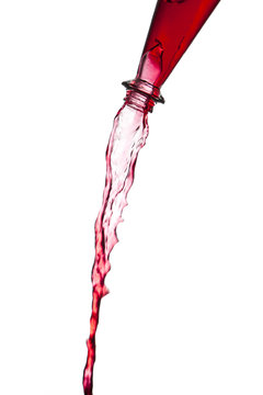 rote Flüssigkeit fließt aus einer Flasche #1