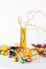 Easter decoration with yellow glass-ware