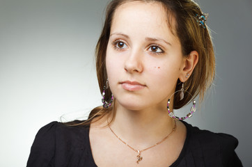 Portrait of elegant beautiful woman wearing jewelry.