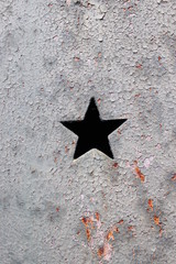 Etoile sur une porte de caveau, Cimetière de Montmartre à Paris