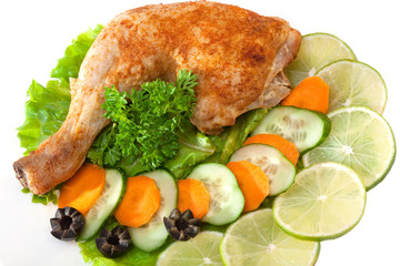 Fried chicken leg with lemon and cucumber