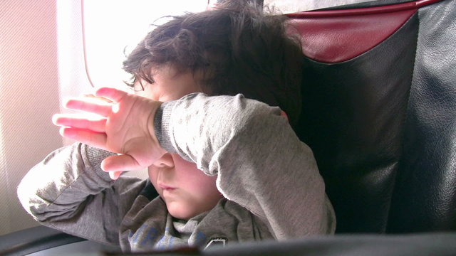 Long Travel and sleeply little boy