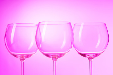 Wine glasses against gradient background