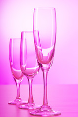 Wine glasses against gradient background