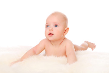 cute naked baby on the fur