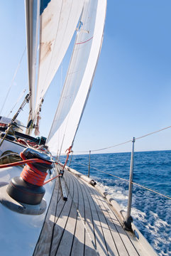 Fototapeta Yacht sailing in the sea