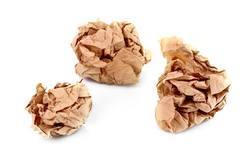 Brown crumpled paper balls isolated on white