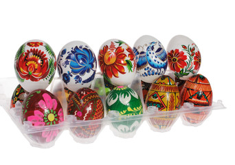 Colorful painted Easter eggs in a red plastic tray