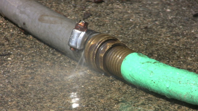 Leaking Garden Hose-Close Up