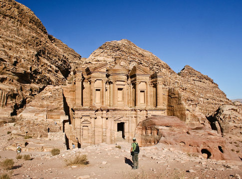 Tourist and the Monastery at Petra Jordan